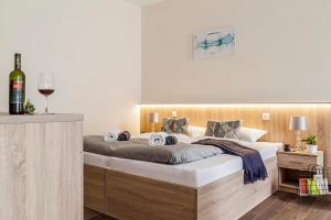 Posteľ alebo postele v izbe v ubytovaní Pilger Apartments