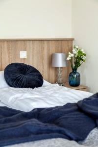 Posteľ alebo postele v izbe v ubytovaní Pilger Apartments