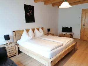 Posteľ alebo postele v izbe v ubytovaní Sonniges Landhaus in den Hohen Tauern