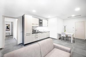 Kuchyň nebo kuchyňský kout v ubytování Como City Home