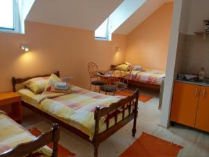 Postel nebo postele na pokoji v ubytování Apartment Harmonija apatin