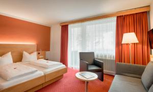 Postel nebo postele na pokoji v ubytování Hotel Jägerhaus