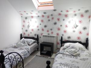Postel nebo postele na pokoji v ubytování Apartment Harmonija apatin