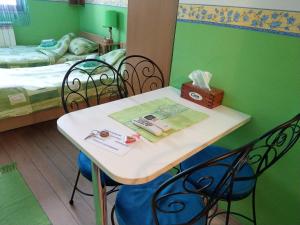 Postel nebo postele na pokoji v ubytování Apartment Harmonija apatin