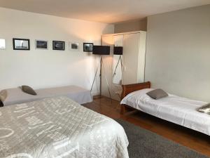 Postel nebo postele na pokoji v ubytování Abri du Passant