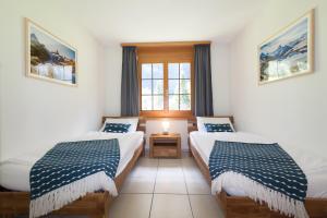Katil atau katil-katil dalam bilik di Apartment Arven