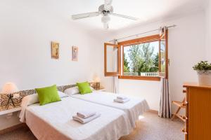 Postel nebo postele na pokoji v ubytování Villa Olivera + 13 fotografií