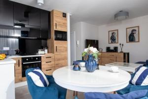 Kuchyňa alebo kuchynka v ubytovaní Resort Apartamenty Klifowa Rewal 32