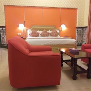 Ένα ή περισσότερα κρεβάτια σε δωμάτιο στο Bowshar International Hotel