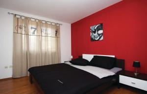 Postel nebo postele na pokoji v ubytování Appartement Stalno Sretan + 19 fotografií