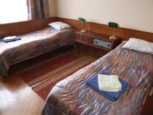 Postel nebo postele na pokoji v ubytování Art Guesthouse