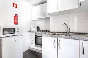 Η κουζίνα ή μικρή κουζίνα στο Alfama Best Balcony +16 φωτογραφίες