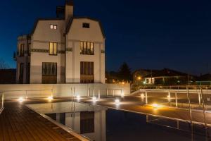 a building with lights in front of a building at Jaizkibel by Basquelidays in Hondarribia