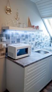 Kuchyňa alebo kuchynka v ubytovaní Lara Apartments