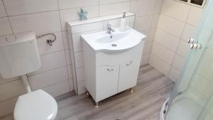 Kúpeľňa v ubytovaní Lara Apartments
