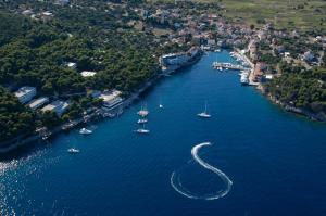 an aerial view of a river with boats in it at Vala in Božava +10 photos