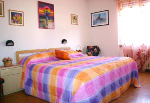 Postel nebo postele na pokoji v ubytování Hotel Passo Buole