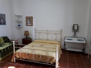 Postel nebo postele na pokoji v ubytování Villa Teseo