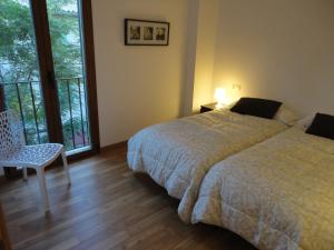Säng eller sängar i ett rum på Residencial Suites Valldemossa - Turismo de Interior