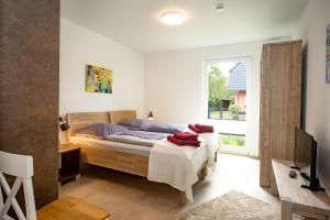 Llit o llits en una habitació de DÜNE-9 in Dierhagen-Strand