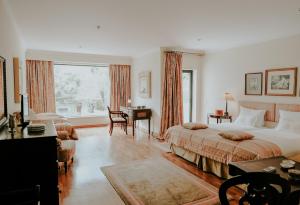 Cama ou camas em um quarto em Challet Fonte Nova