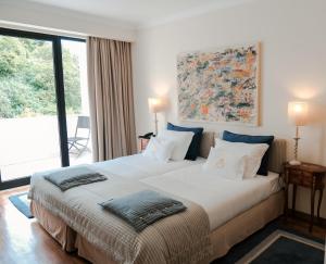 Ένα ή περισσότερα κρεβάτια σε δωμάτιο στο Challet Fonte Nova