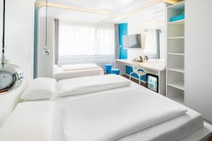 Postel nebo postele na pokoji v ubytování Hotel Knorz