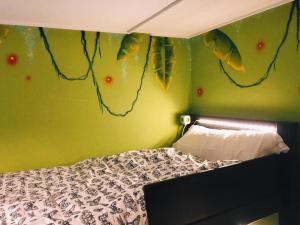 Postel nebo postele na pokoji v ubytování Oripando Hostel