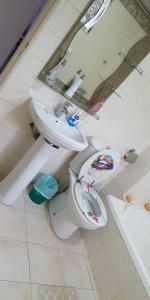 Łazienka w obiekcie Appart Sly Abidjan