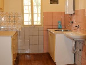 a small bathroom with a sink and a sink at Peaceful Holiday Home in Hol n with Garden in Prachov