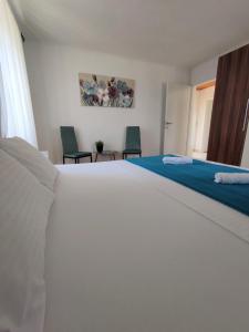Łóżko lub łóżka w pokoju w obiekcie Apartman Josip