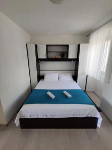 Łóżko lub łóżka w pokoju w obiekcie Apartman Josip