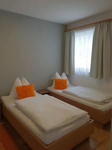 Postel nebo postele na pokoji v ubytování Ferienwohnung Unterlechner