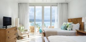 Cama o camas de una habitación en Windjammer Landing Resort and Residences