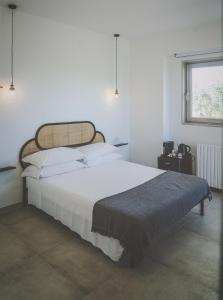 Ένα ή περισσότερα κρεβάτια σε δωμάτιο στο Casa Ziazì Room e Nature