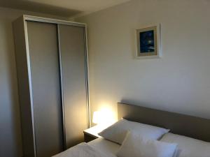 Posteľ alebo postele v izbe v ubytovaní Apartments Trlika