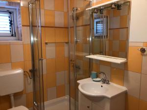 Kúpeľňa v ubytovaní Apartments Trlika