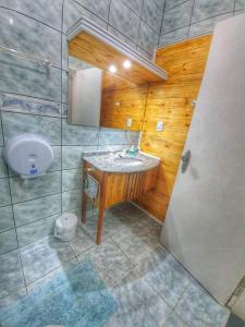 Ванная комната в Pousada Pedra das Tartarugas