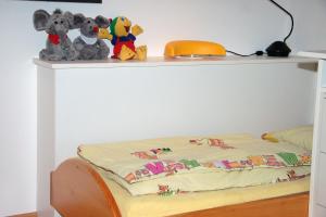 Postel nebo postele na pokoji v ubytování Am Waldrand