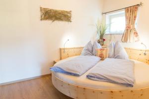 Postel nebo postele na pokoji v ubytování Strauss Appartements