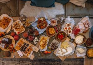 a table topped with lots of different types of food at Quality Hotel Colonial Launceston in Launceston