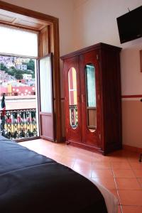 TV a/nebo společenská místnost v ubytování Hotel de la Paz