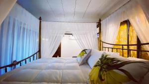 
A bed or beds in a room at สิบสองหน่วยตัด
