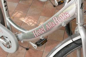 a bike with the words harleyania bottles on it at Hotel Ristorante Alla Botte in Portogruaro
