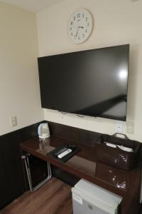 En TV eller et underholdningssystem på Ikebukuro Central Hotel