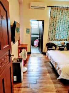 Voodi või voodid majutusasutuse 池上投優榻 Smart living B&B toas