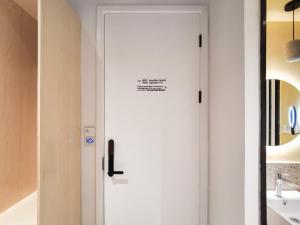 Koupelna v ubytování Roomix Shanghai