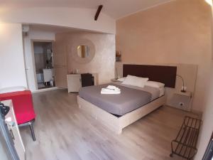 Postel nebo postele na pokoji v ubytování Locanda Sapori