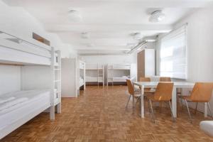 Letto o letti in una camera di C - Punkt Hostel