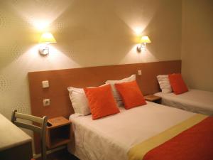 En eller flere senger på et rom på Estrela dos Anjos